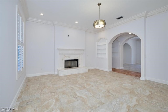 unfurnished living room featuring built in shelves, crown molding, and a high end fireplace