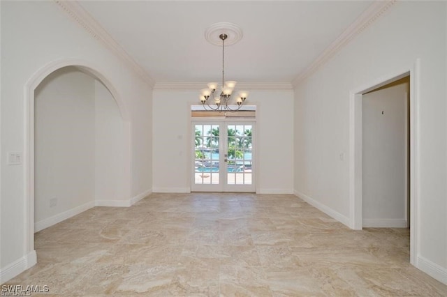 empty room with a chandelier and ornamental molding