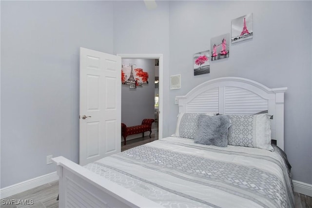 159 Lady Palm Dr, Naples, FL 34104 - bedroom featuring baseboards and light wood-style floors