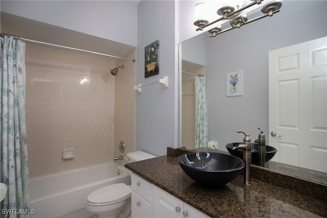 full bathroom with vanity, toilet, and shower / bath combo