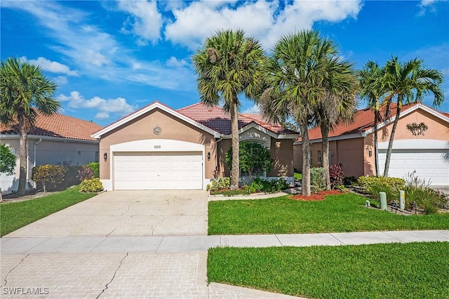 159 Lady Palm Dr, Naples, FL 34104 - view of front of house with a front lawn, a garage, stucco siding, concrete driveway, and a tiled roof