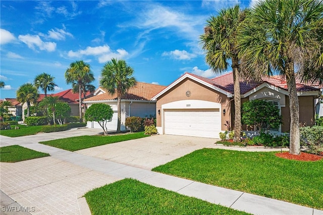 159 Lady Palm Dr, Naples, FL 34104 - view of front of property with stucco siding, concrete driveway, a front lawn, an attached garage, and a tiled roof