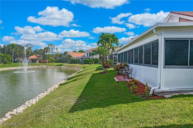 exterior space with a water view