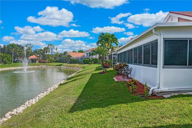 159 Lady Palm Dr, Naples, FL 34104 - view of grassy yard with a water view