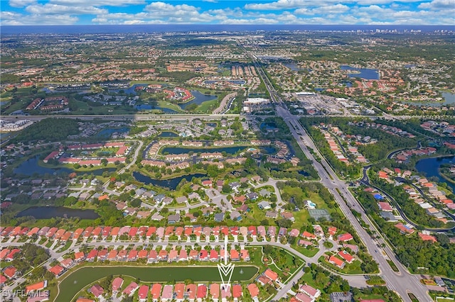 drone / aerial view with a water view