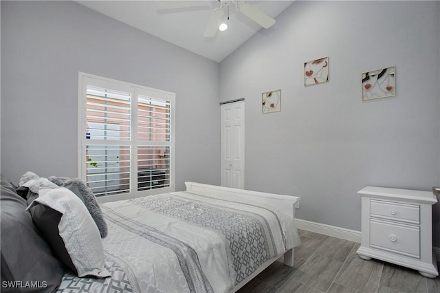 159 Lady Palm Dr, Naples, FL 34104 - bedroom featuring wood finished floors, ceiling fan, and high vaulted ceiling