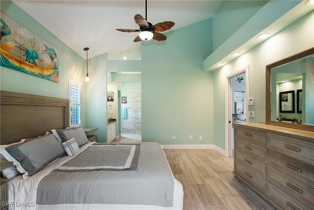 bedroom with connected bathroom, ceiling fan, high vaulted ceiling, and light hardwood / wood-style floors