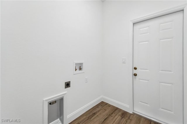 washroom featuring washer hookup, electric dryer hookup, wood finished floors, laundry area, and baseboards