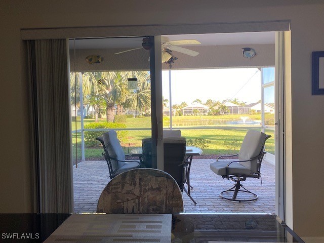 13358 Queen Palm Run, North Fort Myers, FL 33903 - exterior space with a sunroom and a ceiling fan