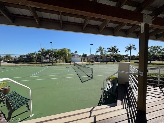 13358 Queen Palm Run, North Fort Myers, FL 33903 - view of tennis court with fence