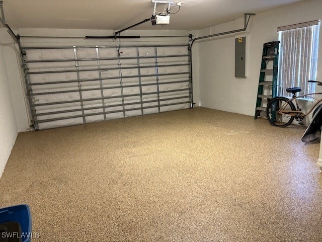 13358 Queen Palm Run, North Fort Myers, FL 33903 - garage featuring electric panel and a garage door opener