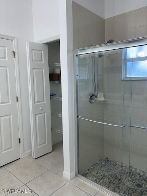 13358 Queen Palm Run, North Fort Myers, FL 33903 - bathroom with tile patterned floors and a shower stall