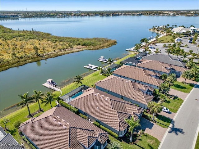 drone / aerial view with a water view