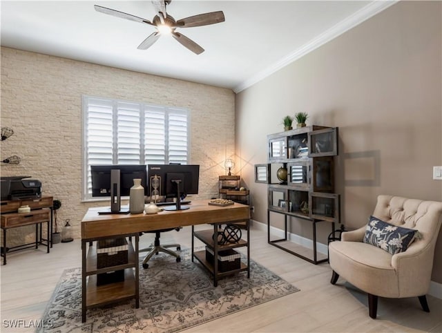 home office featuring light hardwood / wood-style floors, ceiling fan, and ornamental molding