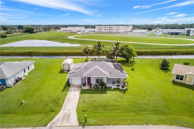 drone / aerial view featuring a water view