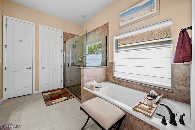 bathroom featuring tile patterned floors and plus walk in shower