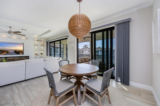 dining space featuring ceiling fan