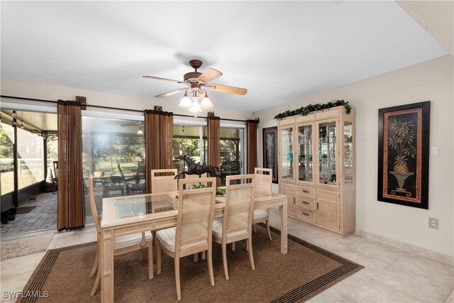 dining area with plenty of natural light and ceiling fan