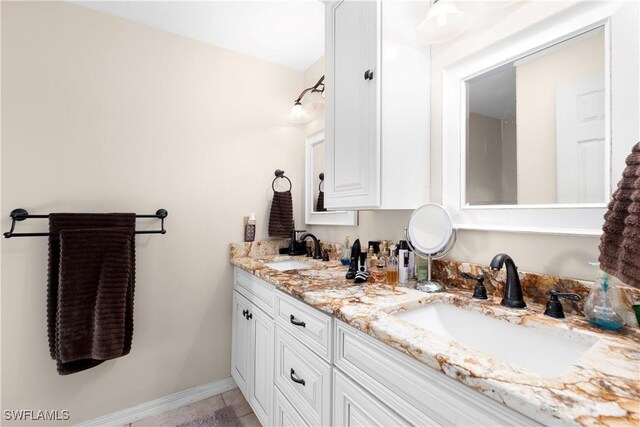 bathroom featuring vanity and tile patterned floors