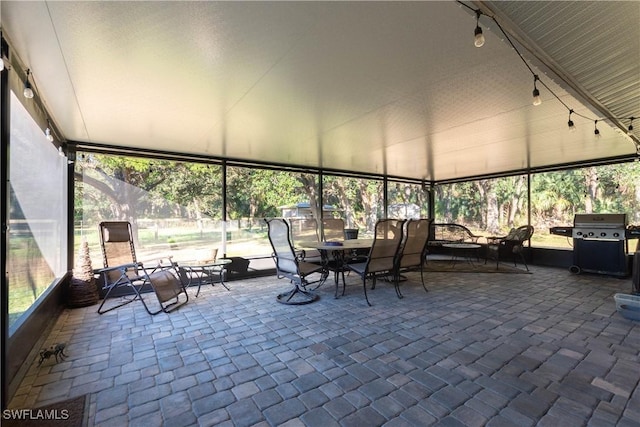 sunroom with rail lighting