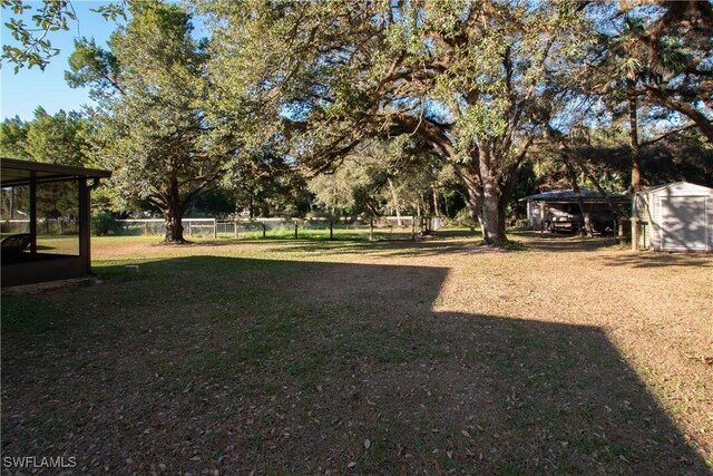 view of yard featuring a sunroom