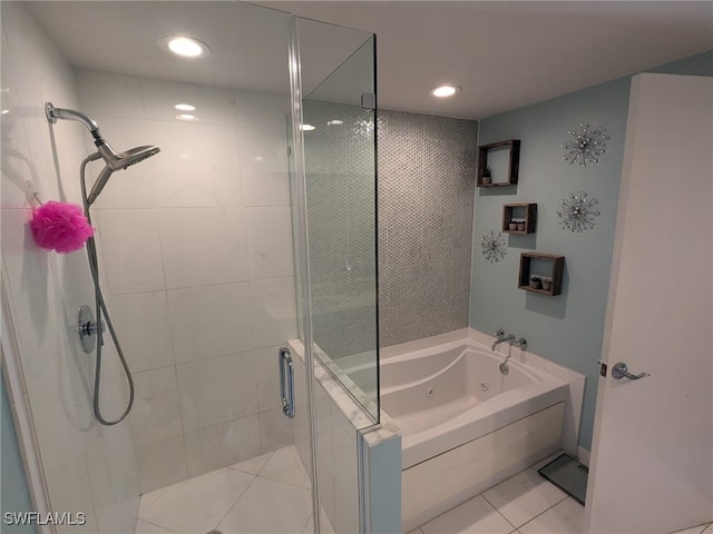 bathroom with tile patterned flooring and plus walk in shower