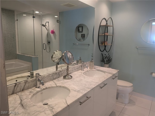 full bathroom with tile patterned floors, vanity, toilet, and shower with separate bathtub