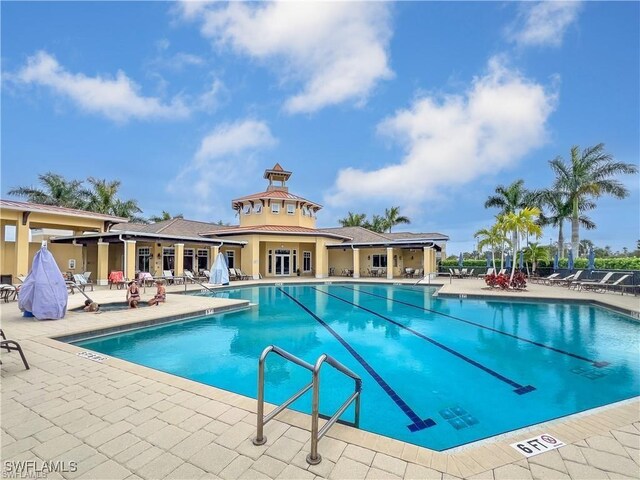 view of swimming pool featuring a patio