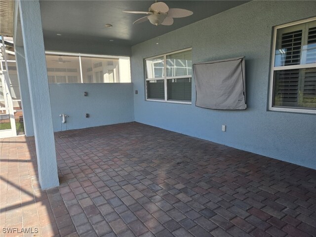 view of patio with ceiling fan