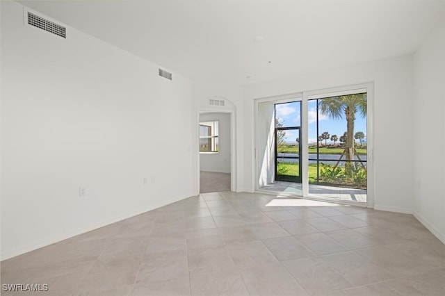 view of tiled spare room