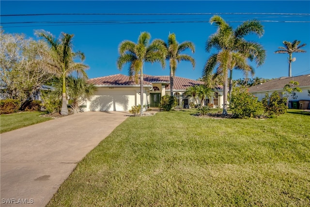 view of front facade with a garage and a front yard