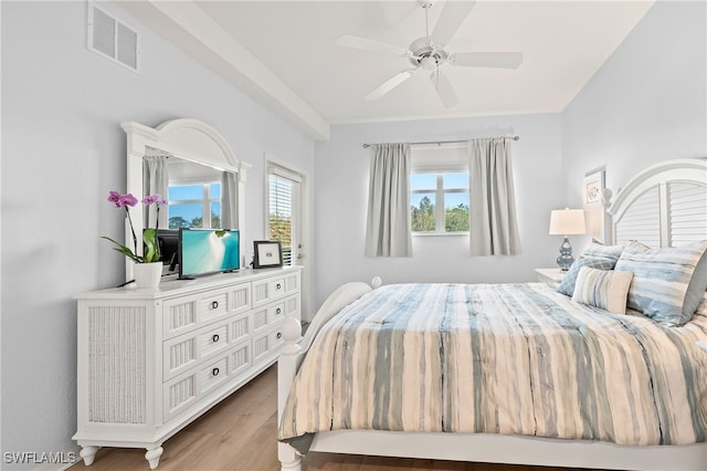 bedroom featuring hardwood / wood-style flooring and ceiling fan