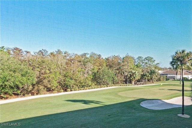 surrounding community featuring a lawn