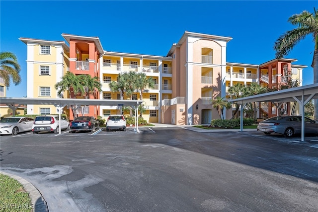 view of property with covered parking