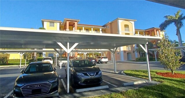 view of parking with a carport