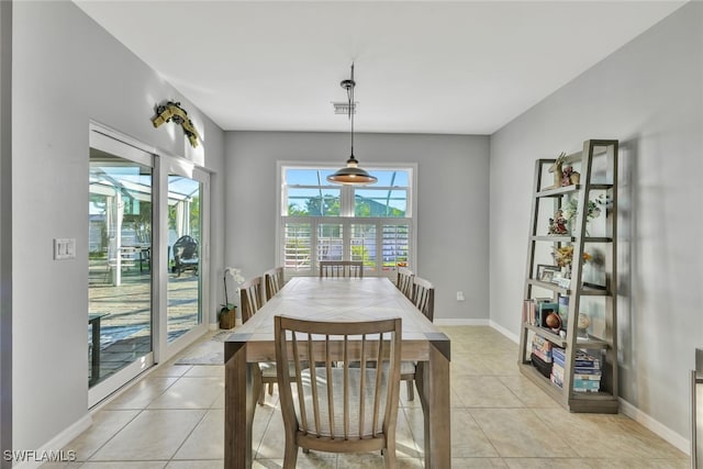 dining room with light tile patterned floors