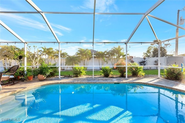 view of pool featuring a lanai