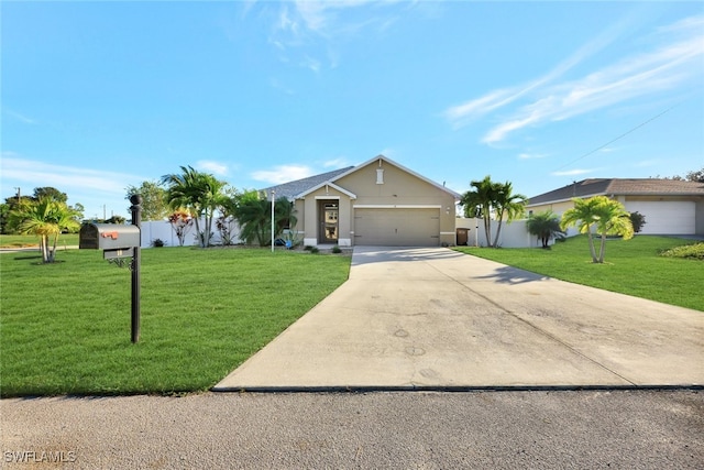 ranch-style home featuring a garage and a front yard