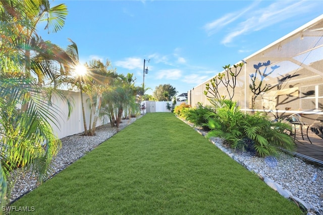 view of yard featuring a lanai