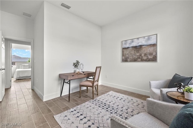 home office featuring hardwood / wood-style floors