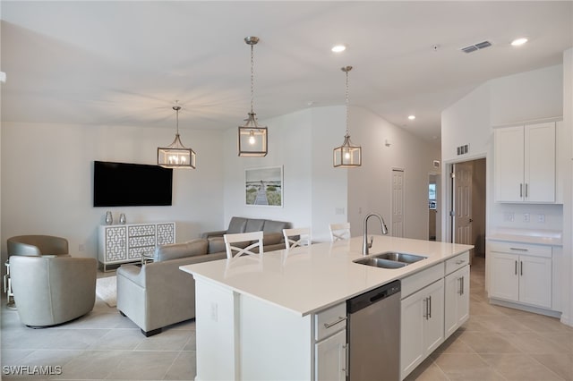 kitchen featuring sink, hanging light fixtures, stainless steel dishwasher, a kitchen island with sink, and white cabinets