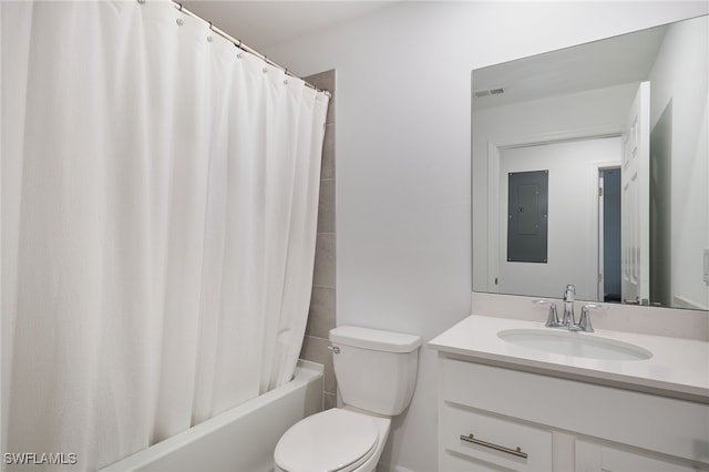 full bathroom featuring vanity, shower / bath combo, electric panel, and toilet