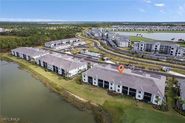 bird's eye view with a water view