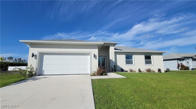 ranch-style house featuring a garage and a front yard