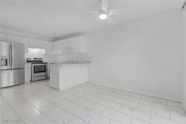 kitchen featuring ceiling fan, sink, white cabinets, and appliances with stainless steel finishes