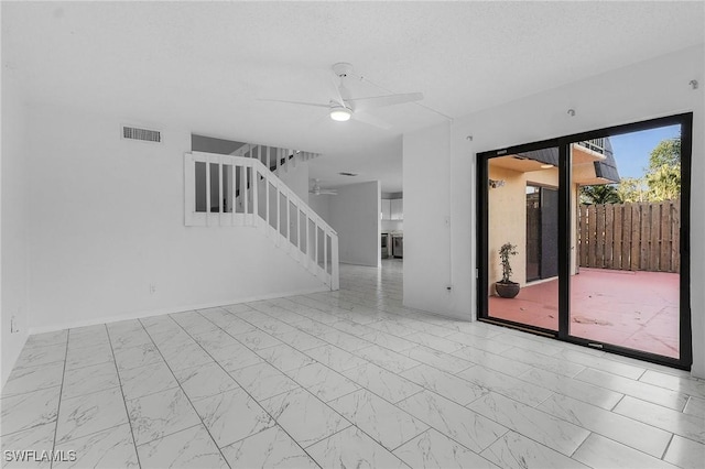 empty room featuring ceiling fan