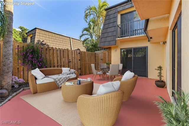 view of patio / terrace with a balcony