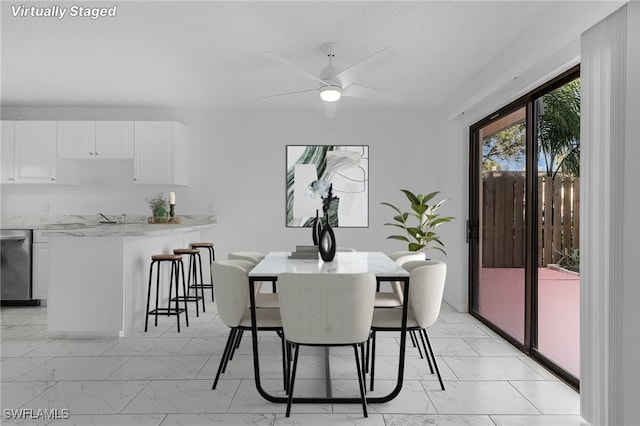 dining area with ceiling fan