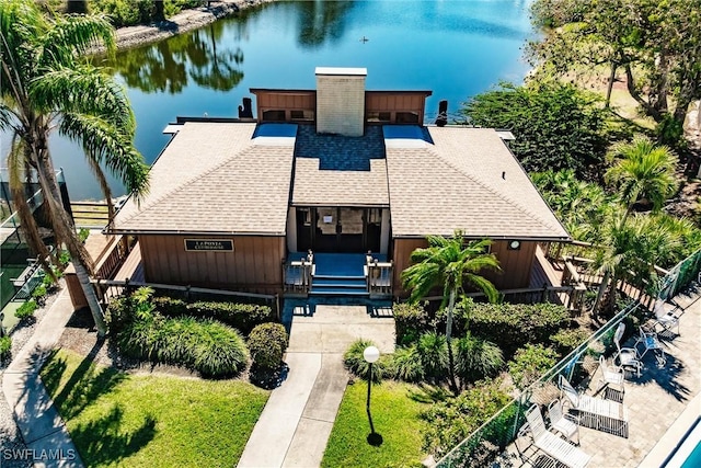 bird's eye view with a water view