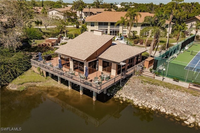 aerial view featuring a residential view and a water view